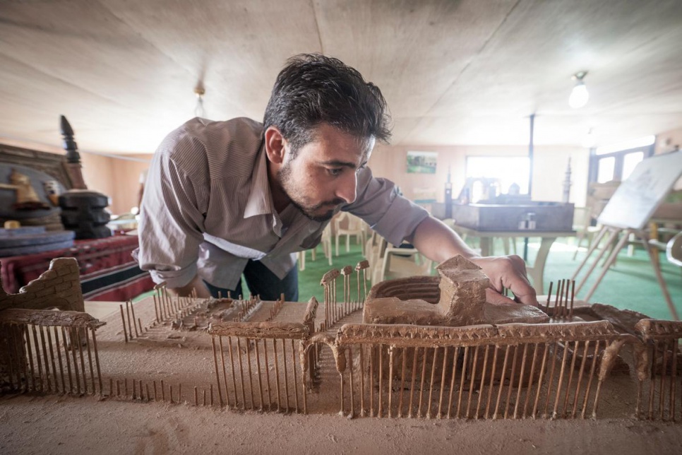 Mahmoud Hariri, 25, was an art teacher and painter in Syria before seeking refuge in Za'atari in 2013. "When I first arrived I didn't think I would continue my work as I only expected to be here for a week or two. But when I realised it would be years, I knew I had to start again or lose my skills."<br><br>Mahmoud built a model of Palmyra using clay and wooden kebab skewers. While working on it, he learned that the site had fallen under the control of armed groups.<br><br>"I'm very worried about what is happening. This site represents our history and culture, not just for Syrians but all of humanity. If it is destroyed it can never be rebuilt."