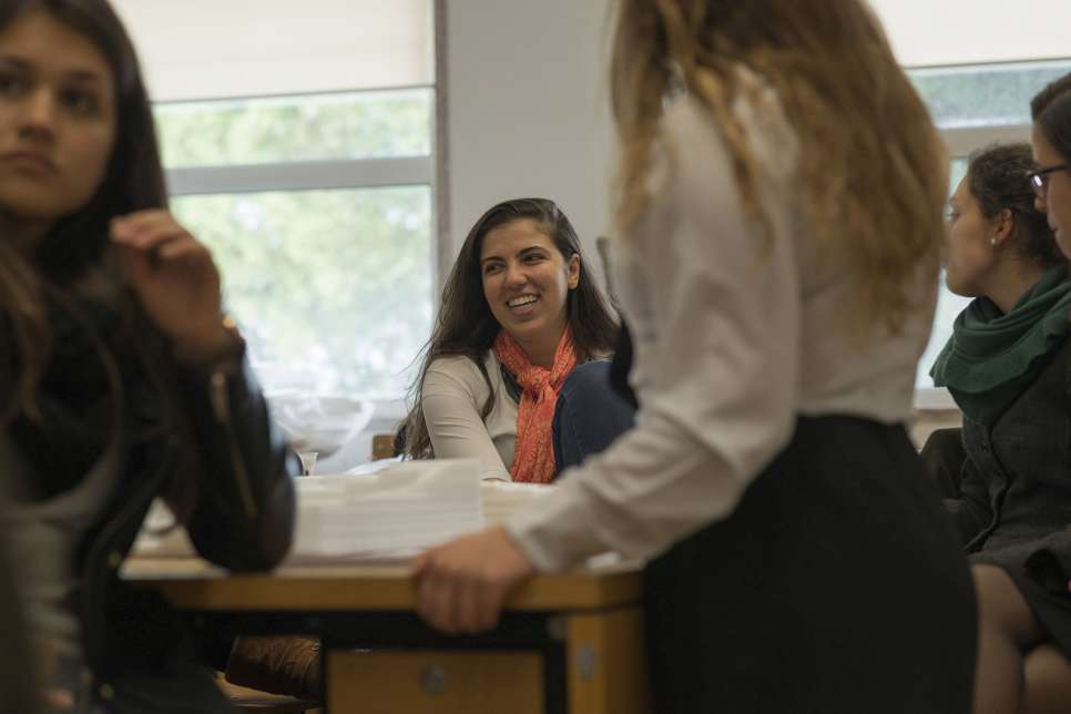 Twenty-two-year-old Alaa with her fellow students at Lisbon University. She has quickly made close friends and enjoys an active social life, when her busy schedule allows.
