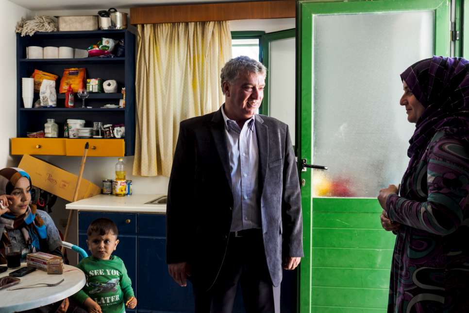 Mayor Nabil-Iosif Morad visits a house where three mothers and their children are staying while they wait for their family reunification claims to be approved.