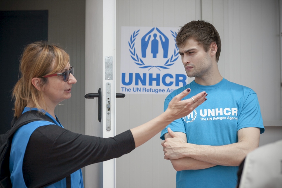 Douglas Booth is shown round the Moria screening centre on the Greek Island of Lesvos.