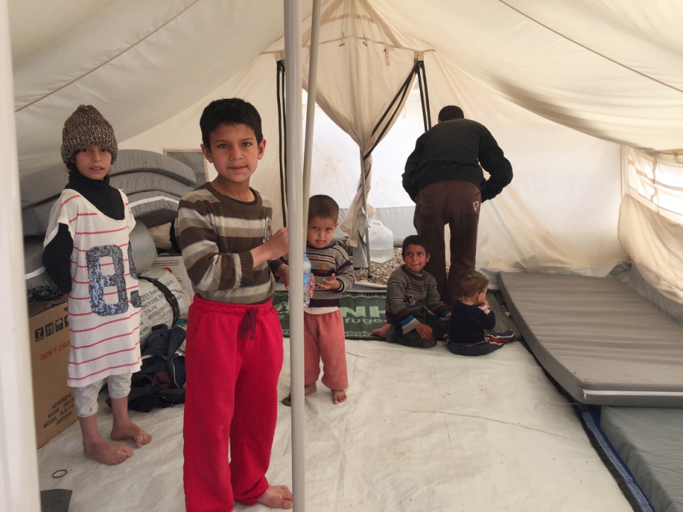 Iraq. Families continue to flee conflict in West Mosul, seeking shelter, safety