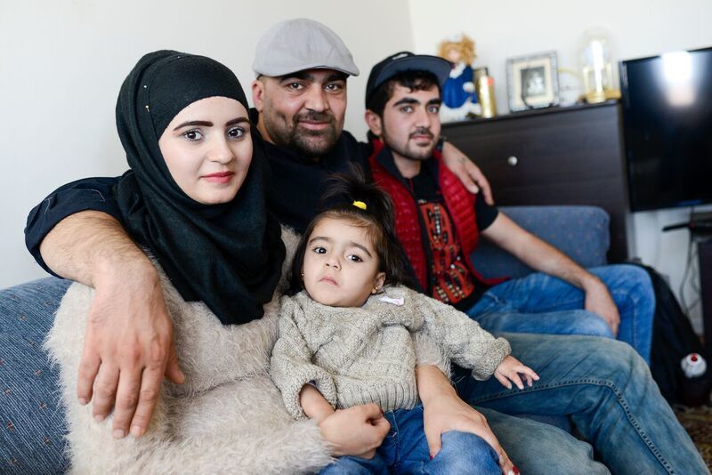 Canada. Newly arrived Syrian family at their home in Ottawa.