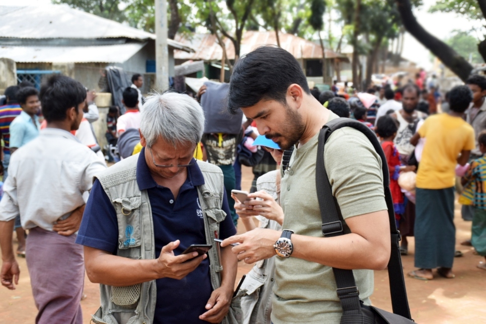 In Cox's Bazar in Bangladesh, UNHCR Senior Emergency Policy Officer Alvin Gonzaga coordinates his activities that day with Atom. 