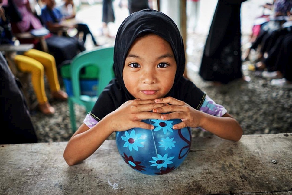 "A little girl plays with a ball at a community-based evacuation centerin Iligan City," writes Atom of this image he shot whilst on mission with UNHCR.