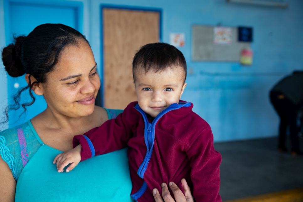 A mother and baby at the San Diego Rapid Response Network Migrant Shelter in San Diego, California.