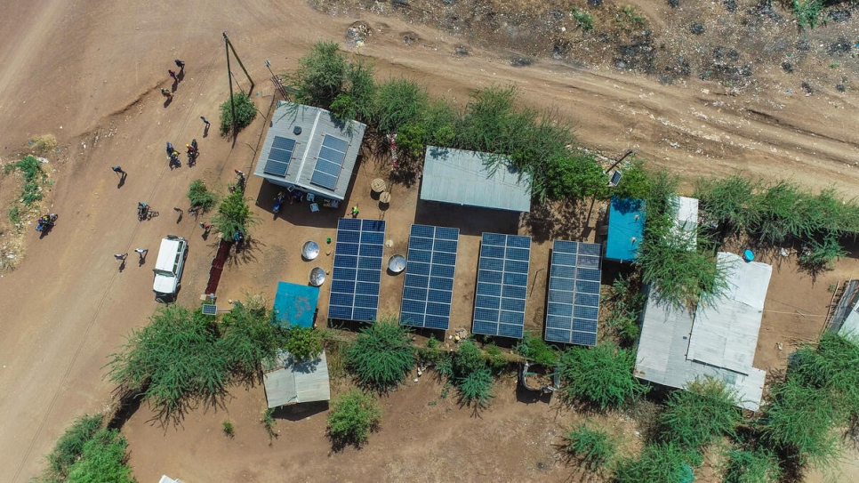 The refugee-owned company Okapi Green Energy harnesses sunlight to provide reliable and affordable energy to 200 refugee businesses and homes via a mini-grid in Kakuma Refugee Camp.