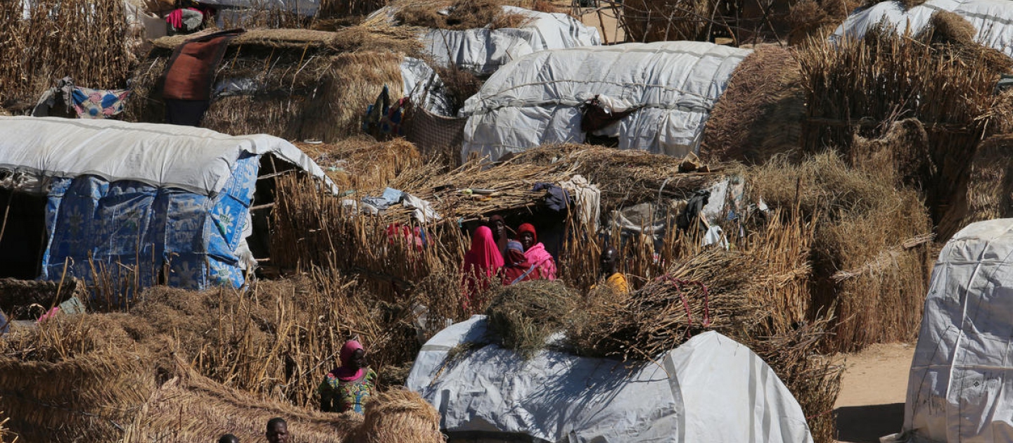 Nigeria. Thatched homes at the Muna Internally displace peoples camp in Maiduguri, Nigeria