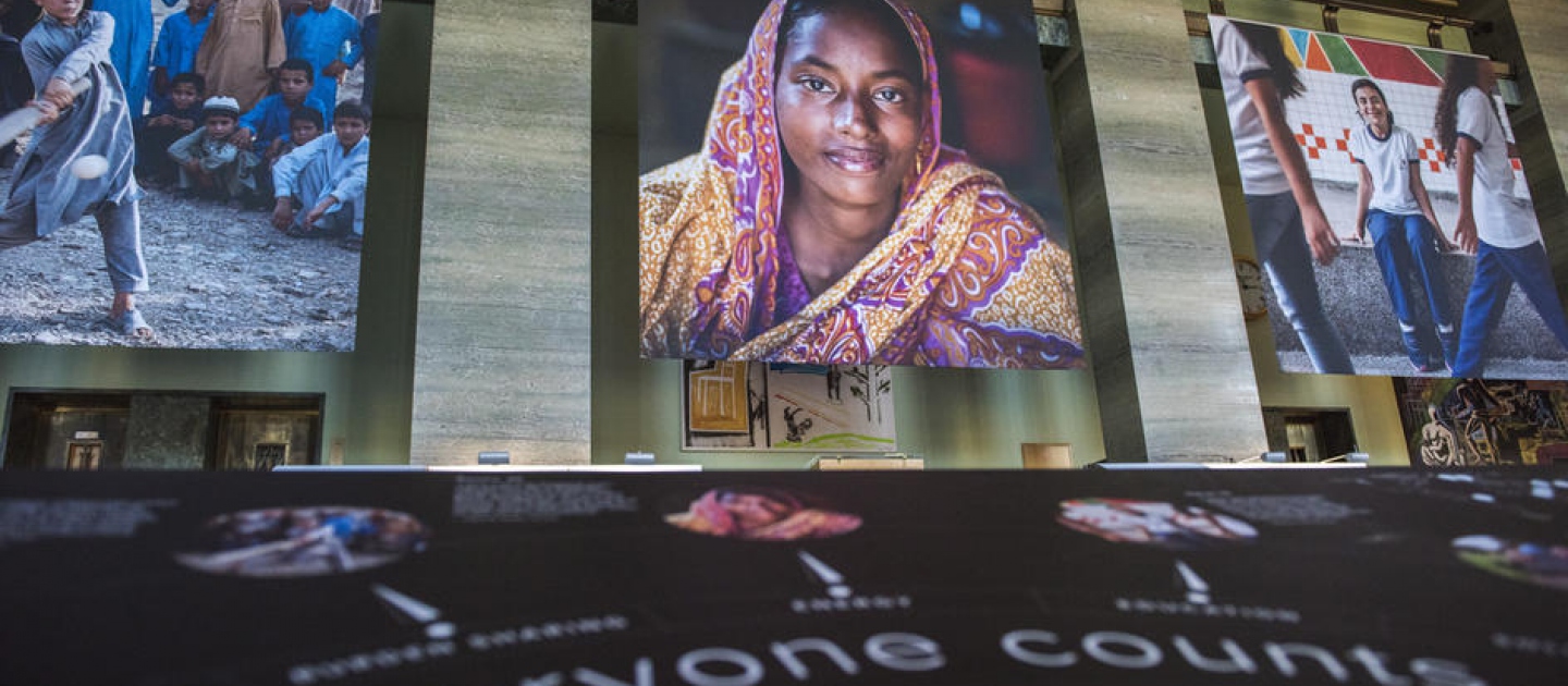UNHCR, the UN Refugee Agency. A banner from the 'Everyone Counts' campaign exhibited in La Salle des Pas Perdu at the Palais des Nations, the United Nations Office at Geneva. 