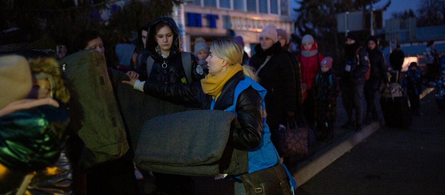 Ukraine. UNHCR distributes blankets to people waiting to cross the border to Poland
