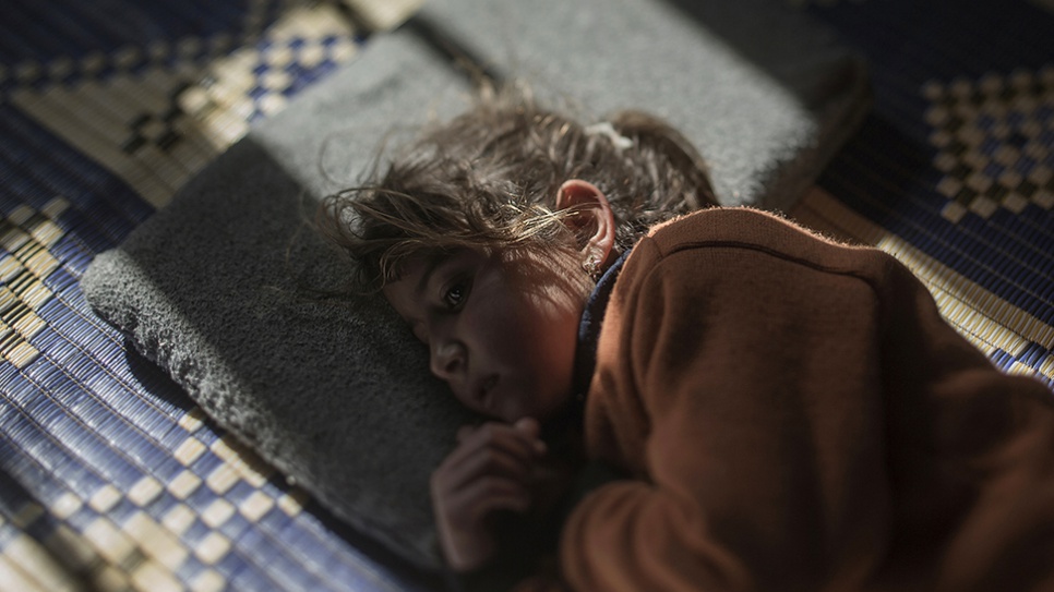 Five-year-old Tamam is scared of her pillow. She cries every night at bedtime. The air raids on her hometown of Homs, Syria, usually took place at night, and although she has been sleeping in exile for nearly two years now, she still doesn't realize that her pillow is not the source of danger.