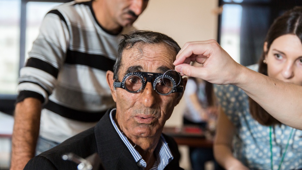 Hasan Hudiyev, 86, has his eyes tested by Akio Kanai and his team.