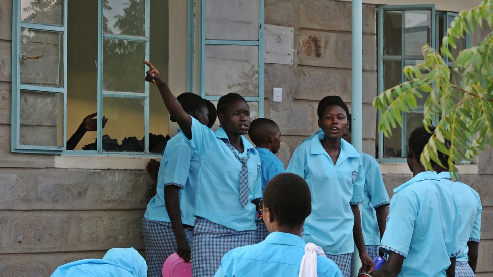 Head girl Esther Nyakong, 18, assigns morning chores to students at the Morneau Shepell boarding school for girls.