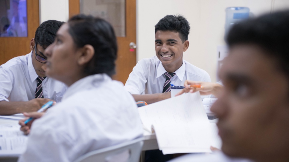Ishak, 15, takes part in class at the refugee learning centre he attends. 