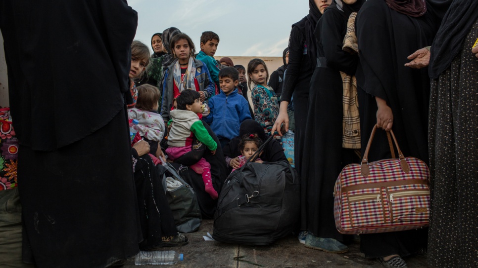 Internally displaced Iraqi families from recently liberated districts of eastern Mosul arrive at Hasansham camp in the Kurdistan Region of Iraq.