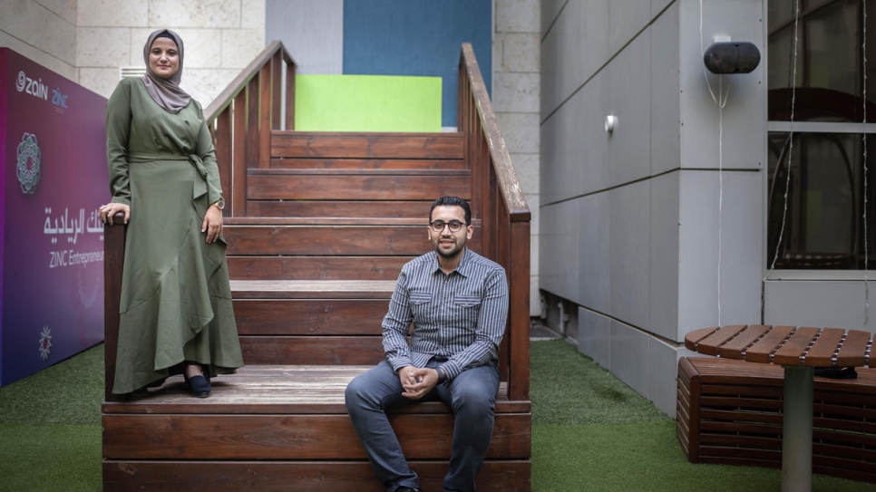Ehab poses with his Jordanian business partner, Amani Alawneh, at Zain Innovation Campus in Amman, Jordan.