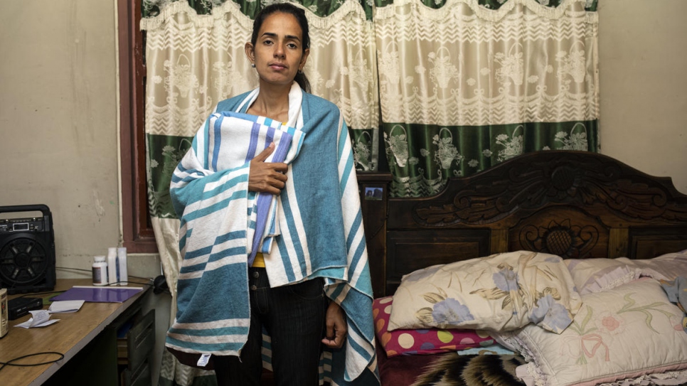 Grexys González se repose dans un abri privé dans la ville colombienne de Pamplona. Elle a été hospitalisée en raison d'une dysenterie amibienne le troisième jour de son périple depuis la frontière entre le Venezuela et la Colombie. 