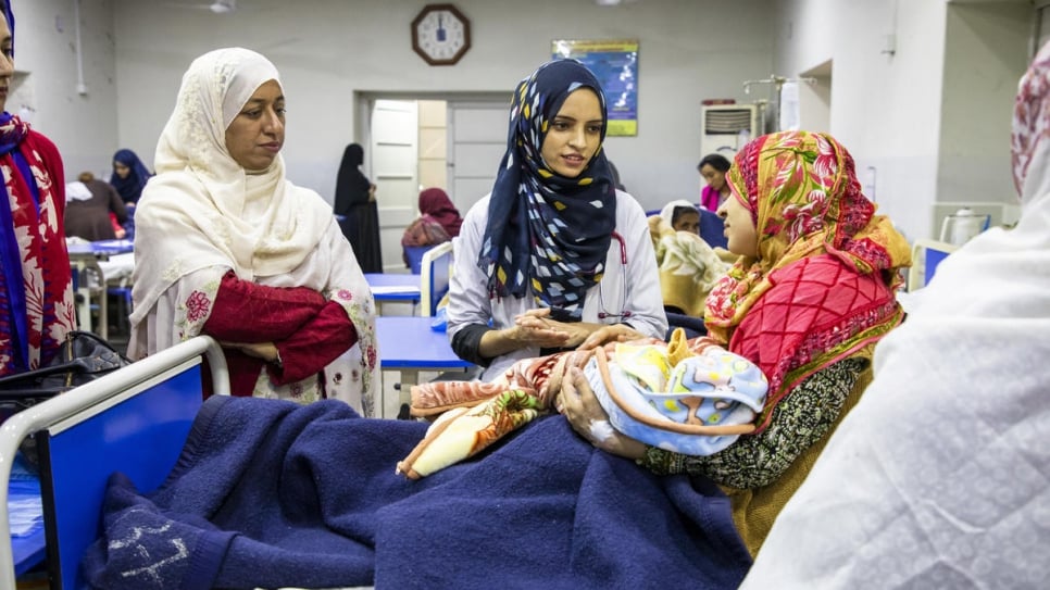 Saleema (centre) with supervisor Humaira Bilgis and a patient at Holy Family Hospital.