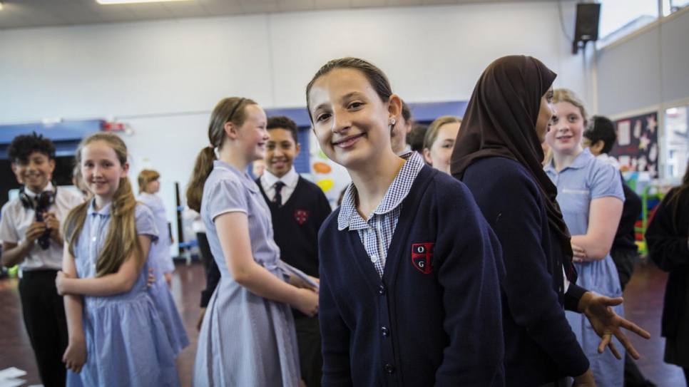 Ola Khaled Jhayem, 11, attends rehearsals for a production of Aladdin at her new school in Liverpool. Ola was surprised to find that sports and art were part of the school curriculum and has already won a 'best player' trophy in football. Her favourite subject is maths, which she will pursue next year at secondary school.