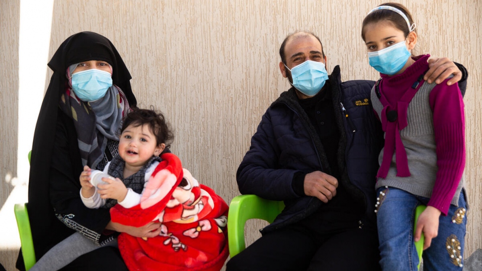 Ahmad, 45, and his family wait for an appointment at a UNHCR registration centre in the Libyan capital Tripoli.