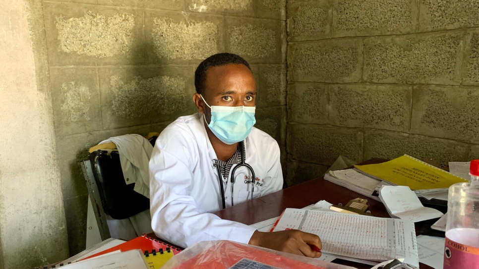 Ethiopian doctor, Haile Haregot, at his desk in the makeshift clinic where he leads a group of volunteer staff in Mekelle, Ethiopia. 