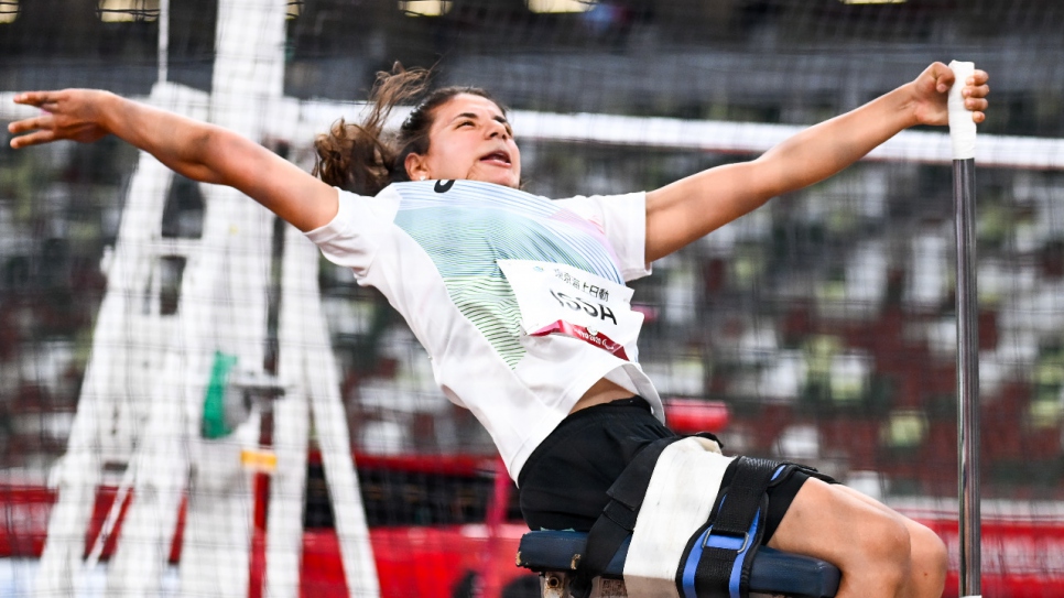 Alia Issa, the first woman to join the Refugee Paralympic Team, competes in the Women's club throw F32 in Japan's National Stadium.