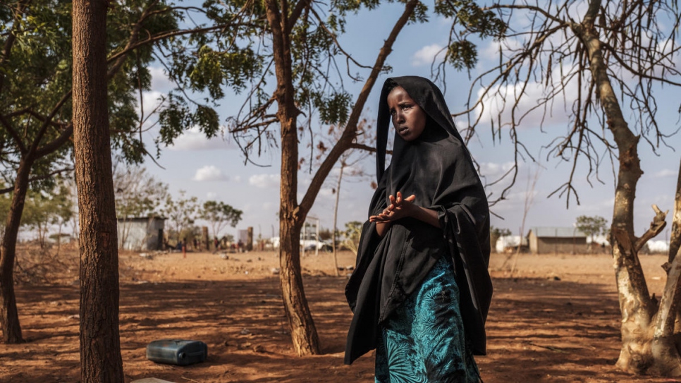 A young Somali woman looks pensive at a school used as a temporary shelter in Bur Amino, Ethiopia.