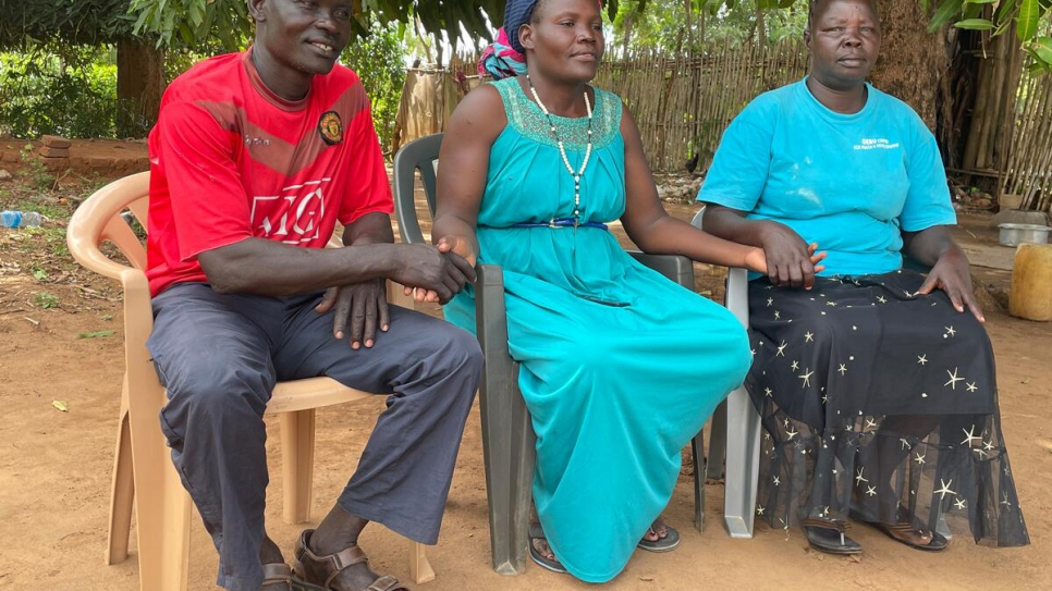 Rebel fighter turned peace activist Francis Otto Okumo (left) sits with activists Anyek Rose John (centre) and Acha Josephine Abui (right) on the patio of Rose's restaurant in Magwi.