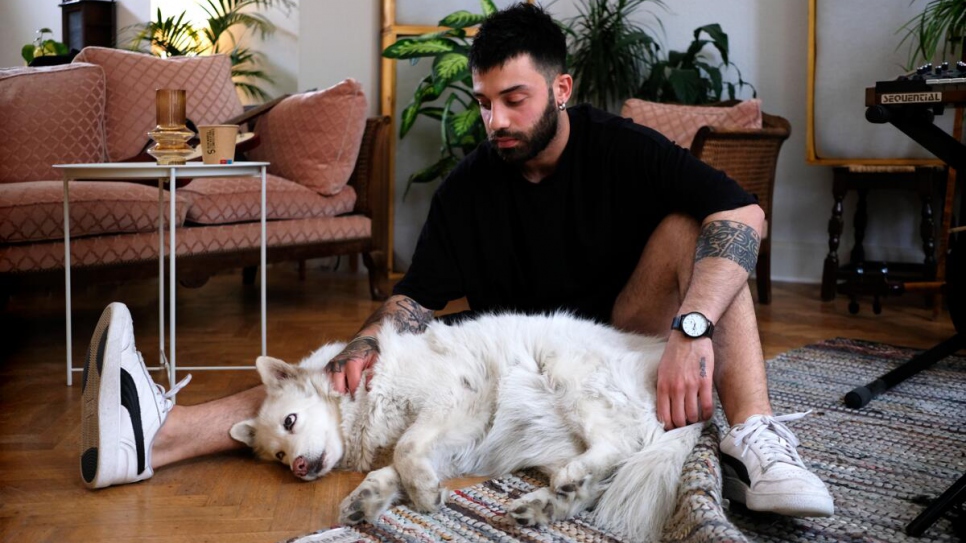 UNHCR - Syrian musician and his dog reunited after journey to safety in Belgium - Vimarsana News