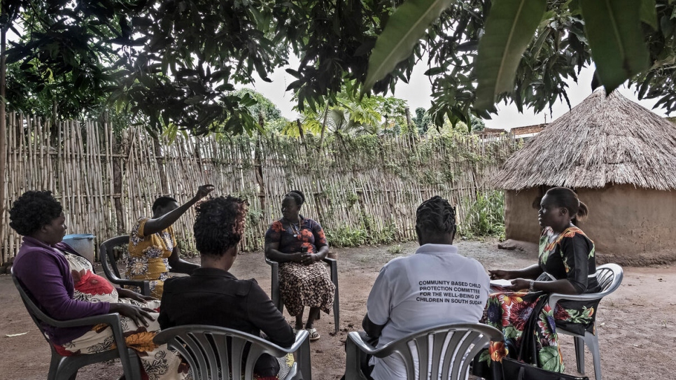 Rose (right) leads a session with women at a village near Magwi. Rose and her group provide free mediation services.