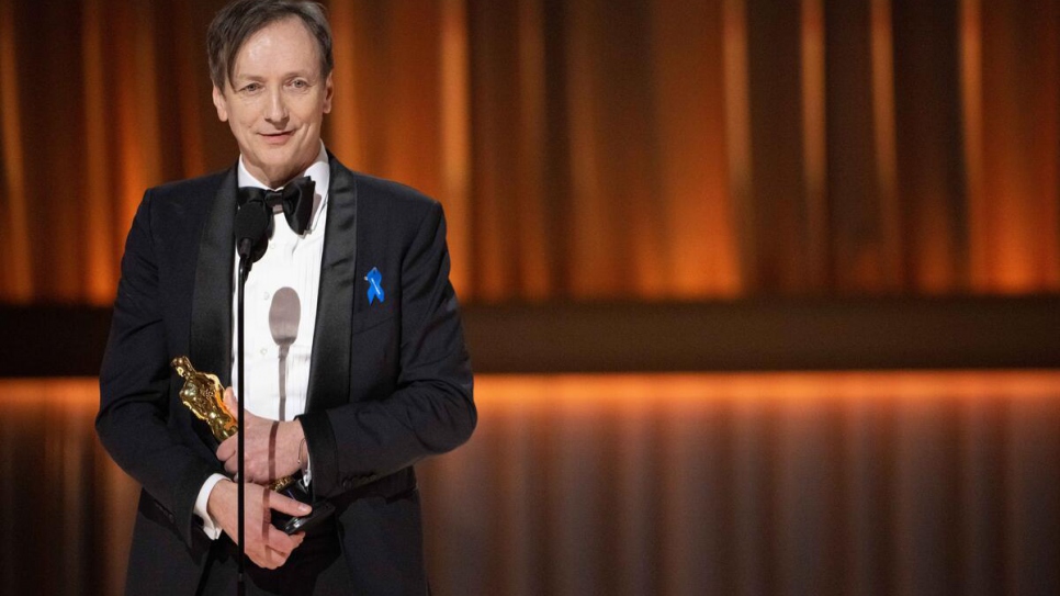 Volker Bertelmann accepts the Oscar® for Original Score during the live ABC telecast of the 95th Oscars® at the Dolby® Theatre at Ovation Hollywood on Sunday, 12 March 2023.