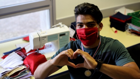 France. Young Afghan makes hundreds of masks to protect village from COVID-19