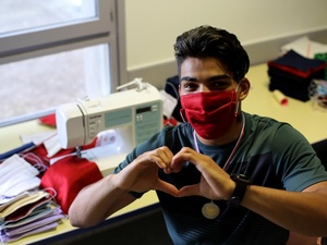 France. Young Afghan makes hundreds of masks to protect village from COVID-19