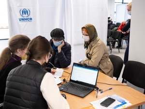 Poland. Refugees from Ukraine wait to register for cash assistance in Warsaw