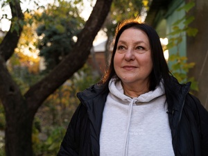 Larysa near her house in Kharkiv 