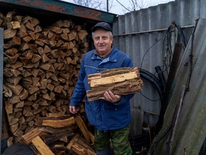 Fedir received winter cash assistance from UNHCR and purchased enough wood for winter. 