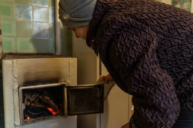 In rural areas of Ukraine, firewood is one of the primary and most reliable ways to heat homes during winter. 