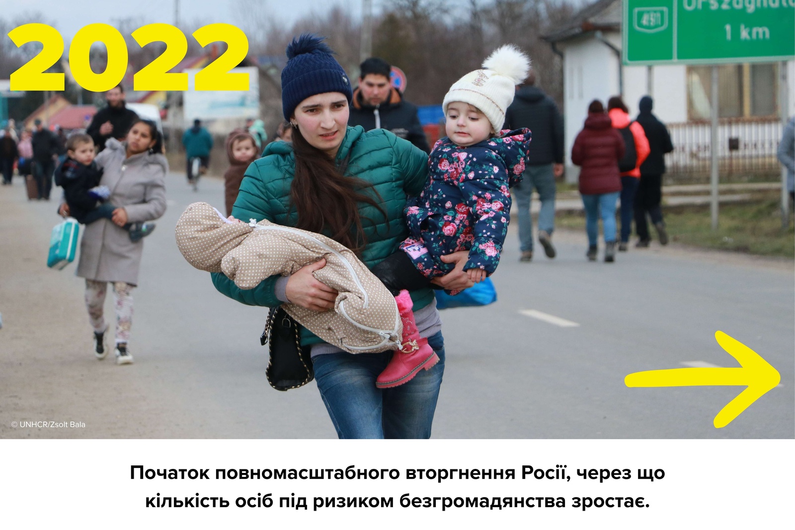 Woman with two kids crossing the border.