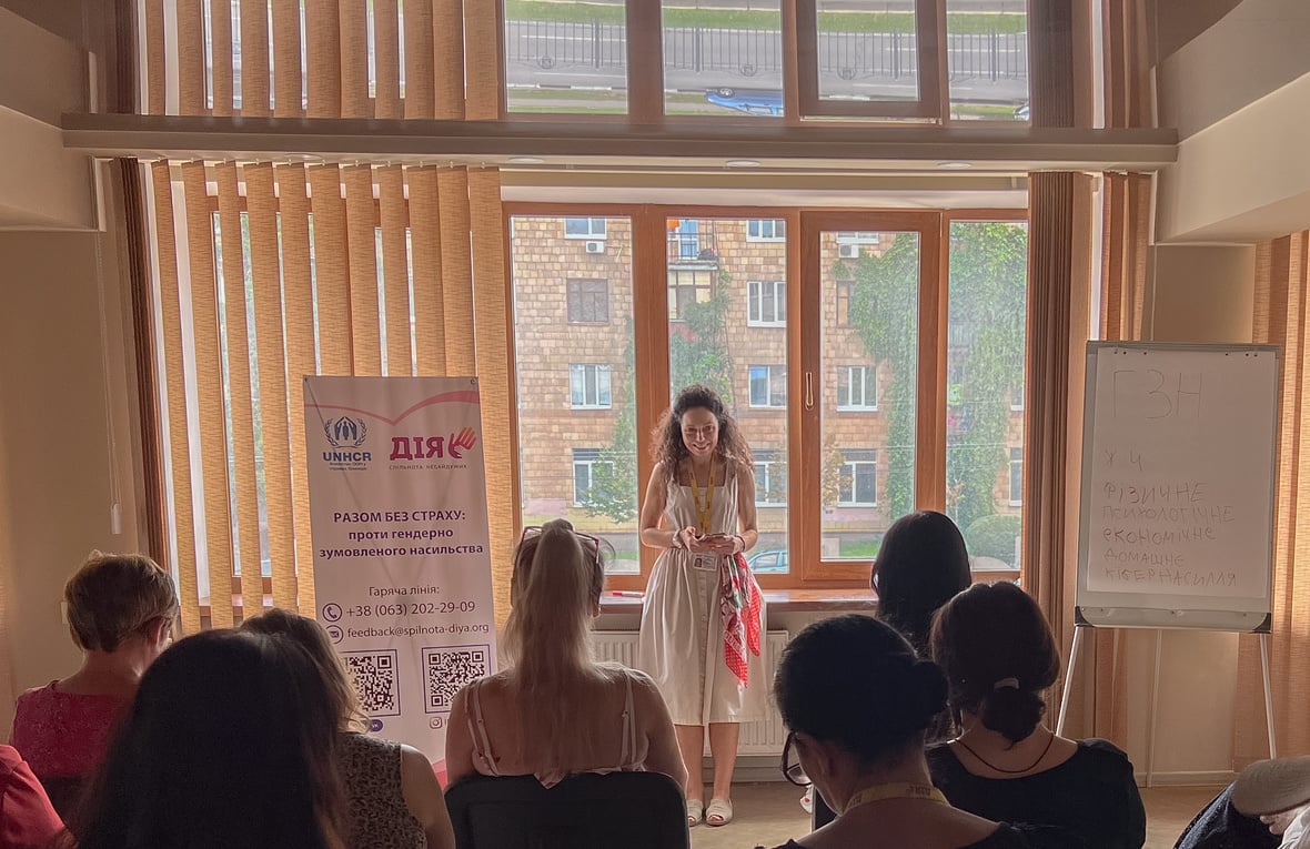 A woman is making a speech during the event