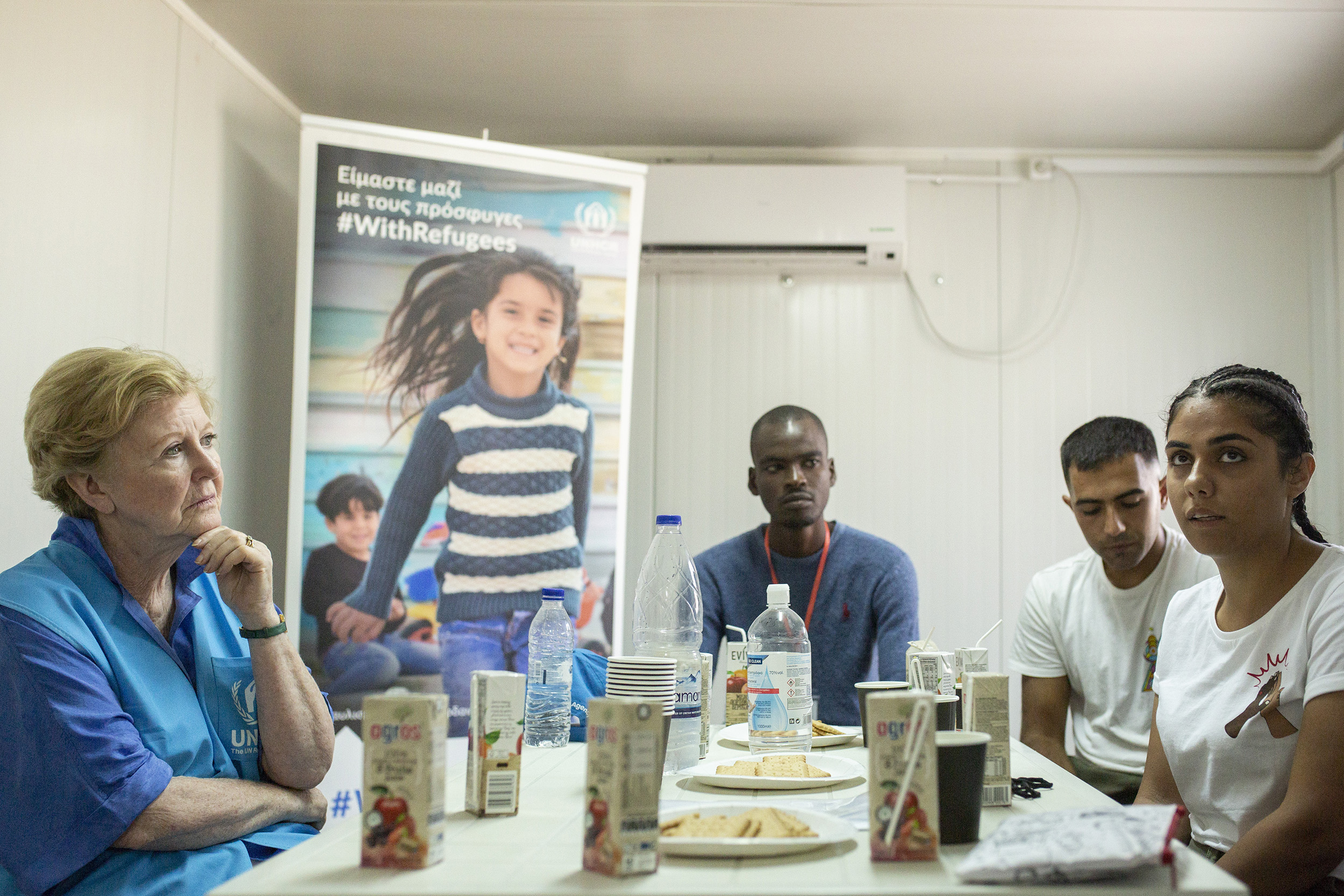 UNHCR Assistant High Commissioner for Protection Gillian Triggs is discussing with a group of asylum seekers in the Closed Controlled Access Centre on Samos island, Greece.