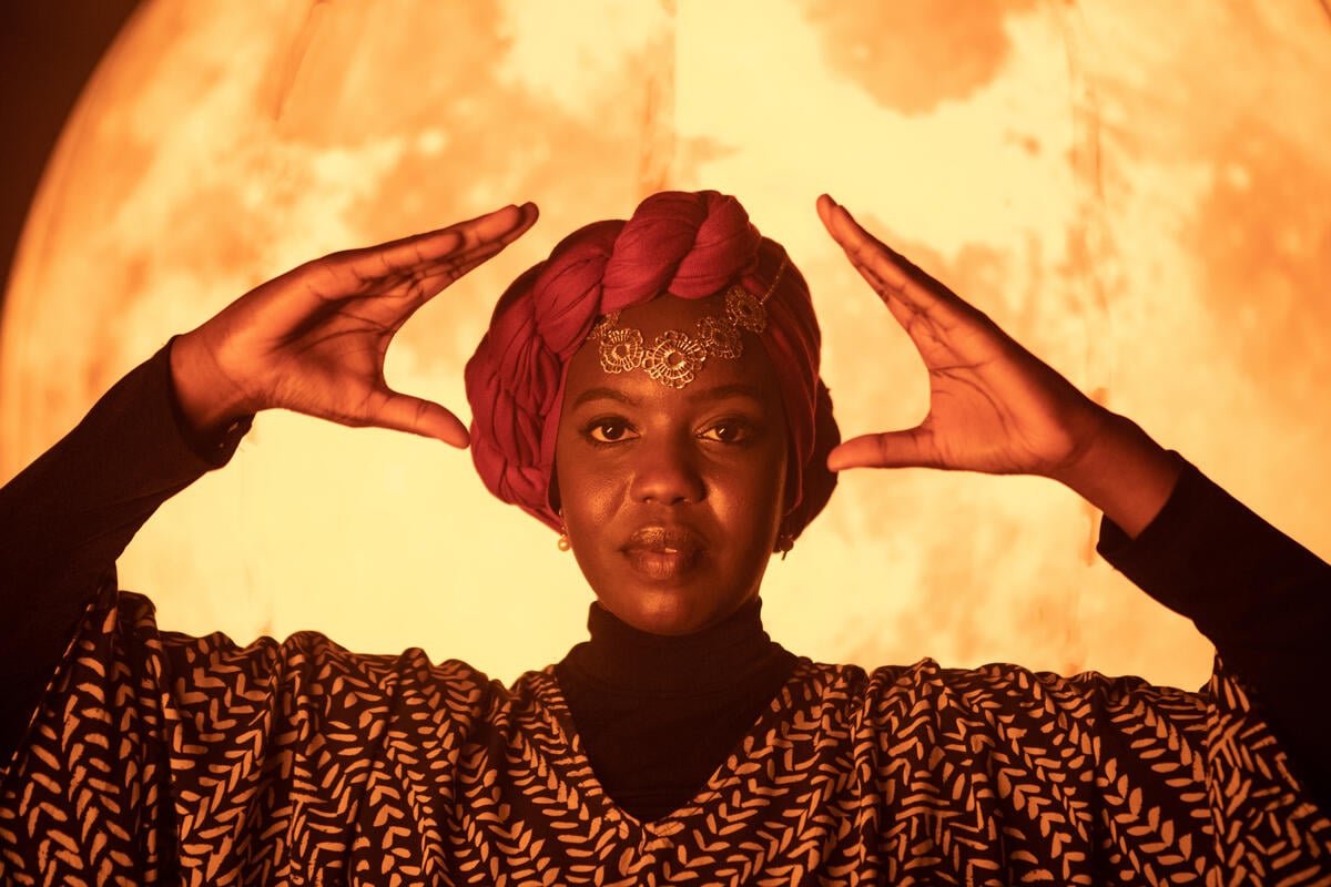 Emtithal (Emi) Mahmoud on set for the UNHCR production of her poetry film.