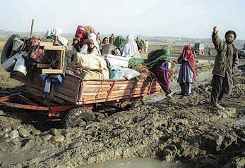 Afghan refugees returning home from Pakistan late last year.