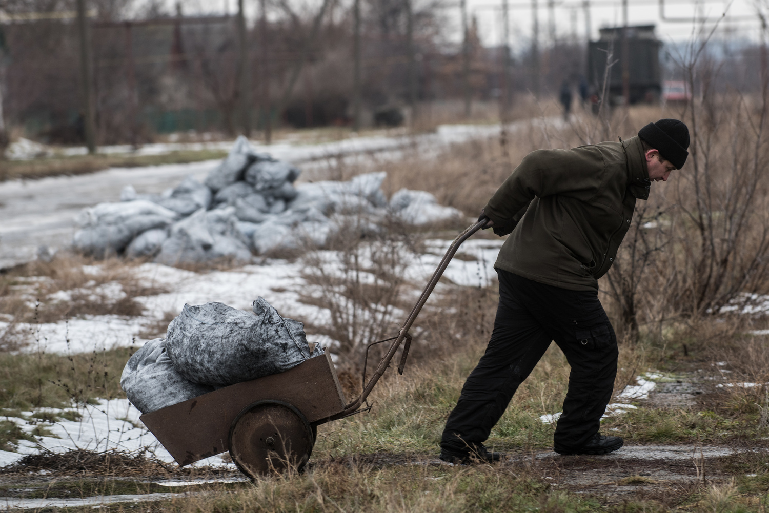 Ukraine. UNHCR delivers coal to village on the frontline