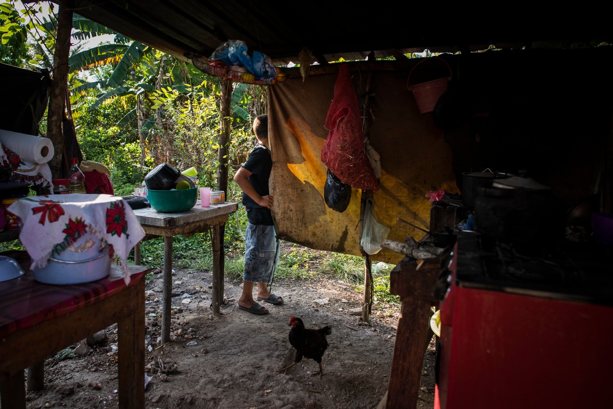 Belize. Daily life of family who fled from gangs violence of El Salvador.
