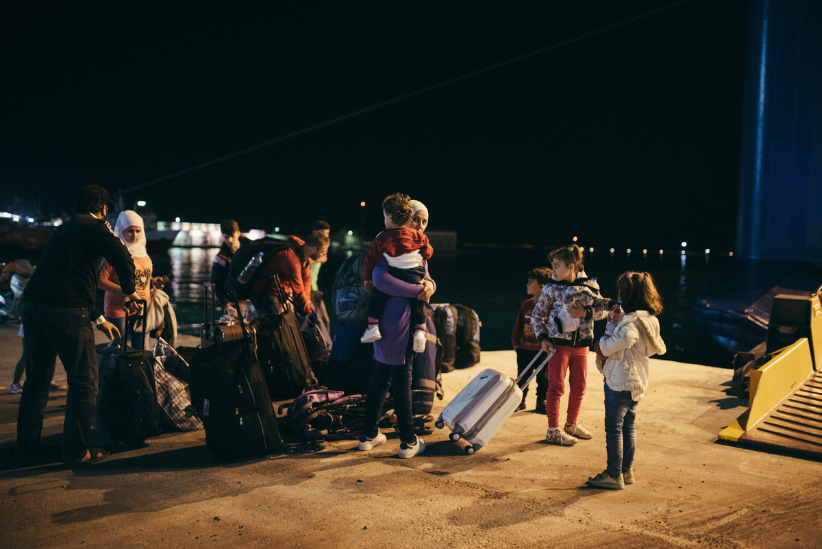 Greece, boarding a ship in the process of relocation.