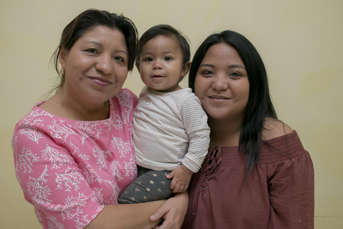 Costa Rica. Gloria Hernández, entrepreneur, refugee from El Salvador, the family now has a new smile