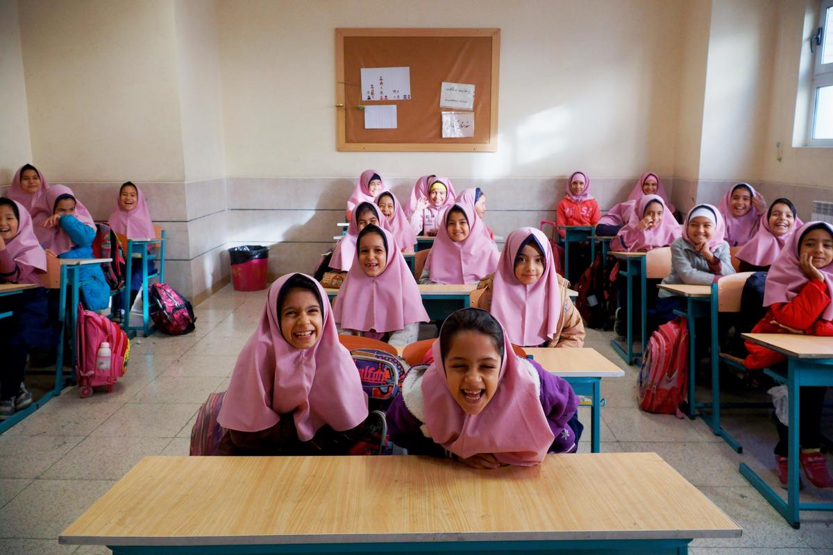 Iran. Afghan refugee sisters go to school for the first time