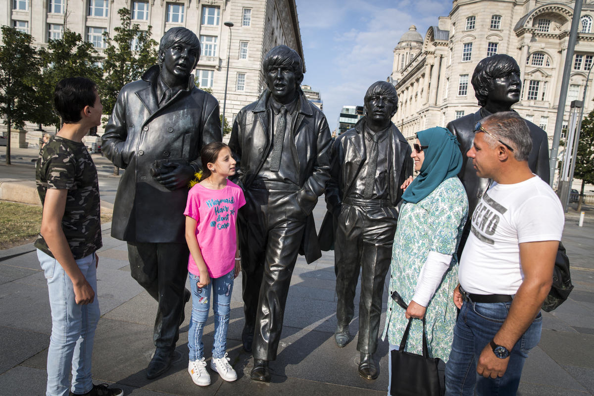 United Kingdom. Liverpudlians welcome Syrian family to Merseyside
