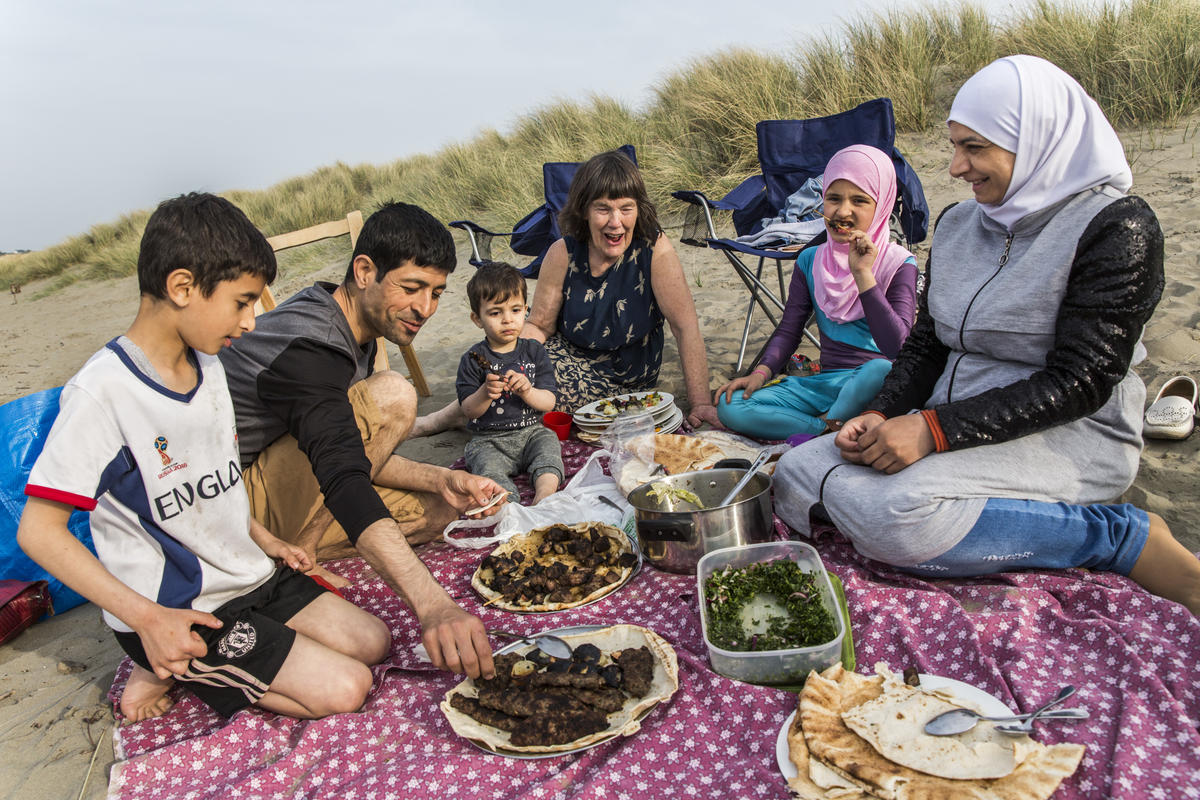 United Kingdom. Community volunteers help Syrian family integrate in Wales
