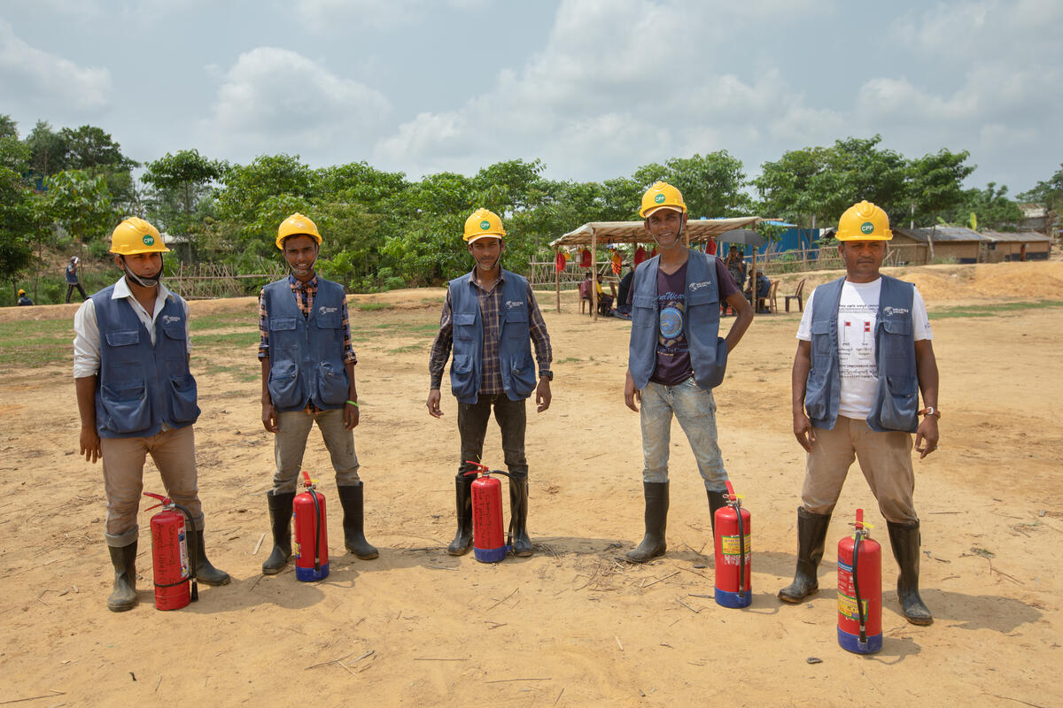 Bangladesh. Refugee volunteers receiving training on how to control fires that break out in shelters