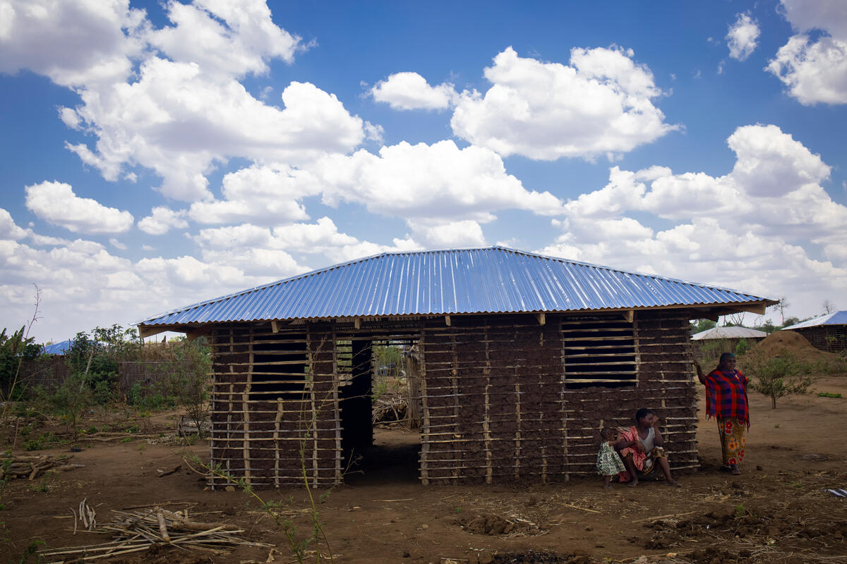 Mozambique. Displaced woman in new home in Corrane site